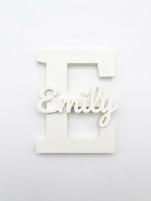 Blank white name sign reading Emily