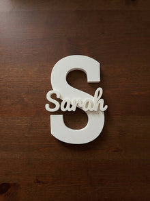 Blank white name sign reading Sarah