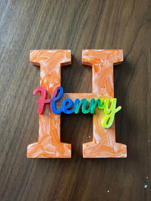 Painted name sign reading Henry